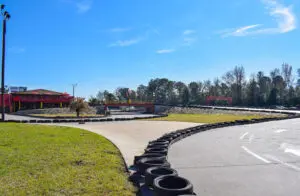 An elevated view of the go-kart track seen from the back end of the building. | Go-Kart Raceway